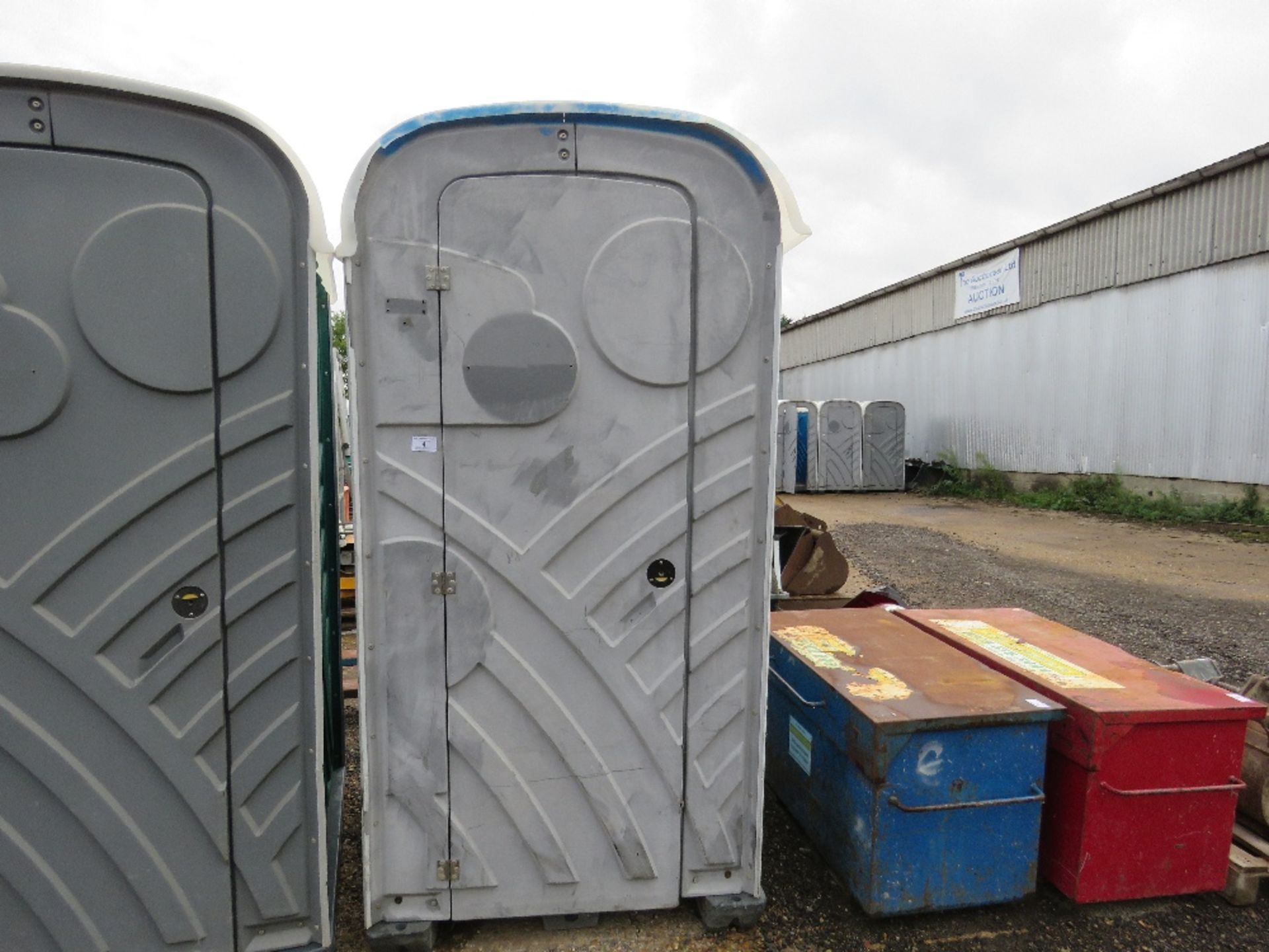 PORTABLE SITE TOILET WITH HAND SANITISER STATION.