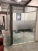 GLASS OFFICE SECTIONS. DISMANTLED. APPROXIMATELY 15-16 GLASS PANELS PLUS FLOOR PLASTIC RAILS. SEE TH