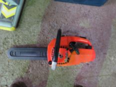 SMALL ORANGE PETROL CHAINSAW.