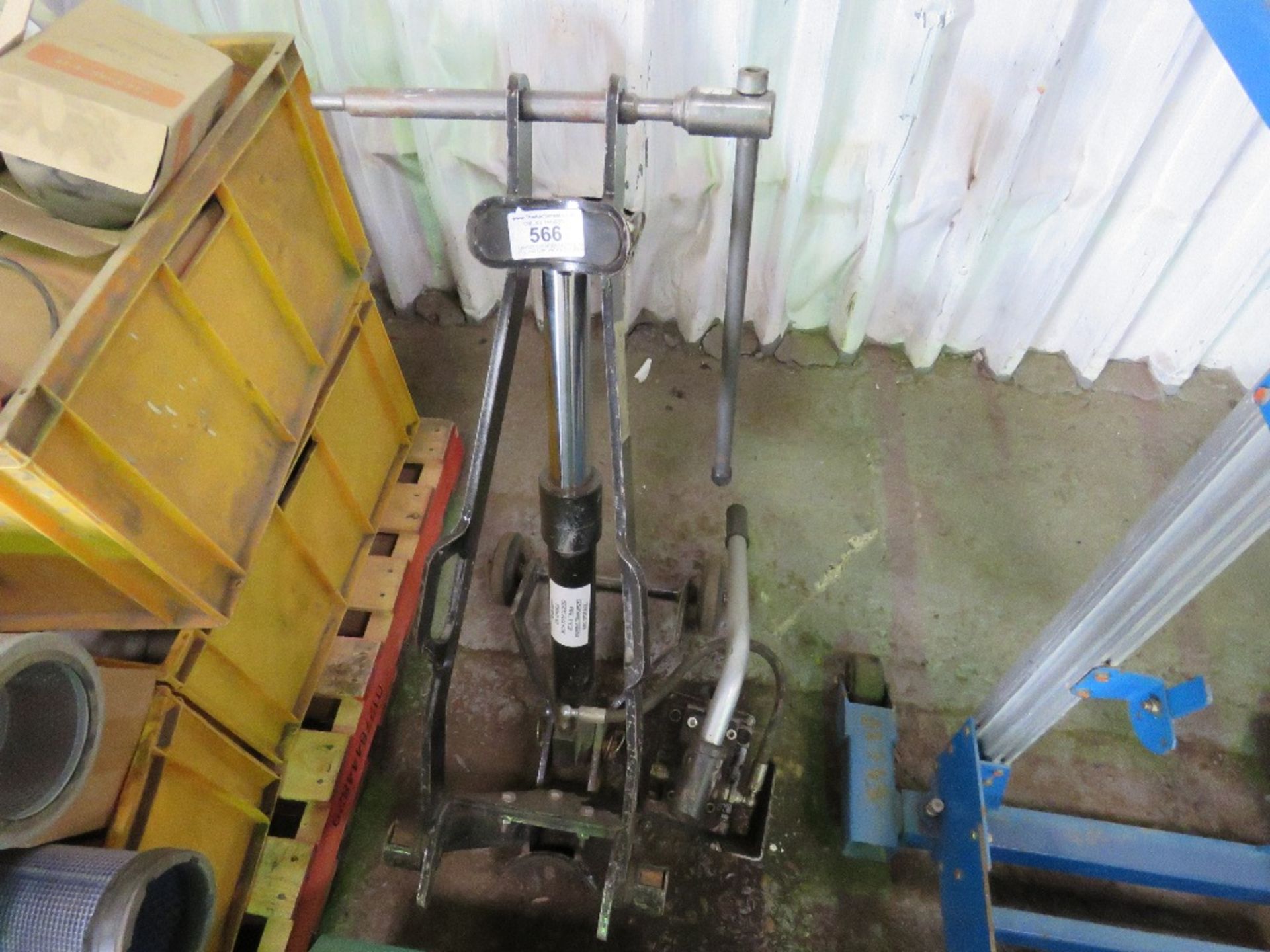 ABACUS COUNTER BALANCE POST PULLING UNIT WITH HAND OPERATED HYDRAULIC PUMP.