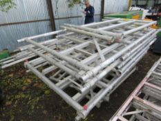 ALUMINIUM SCAFFOLD TOWER SYSTEM WITH INTEGRAL LADDERS. 5 SECTIONS @ 1.8M HEIGHT PLUS 2 1.2M HANDRAIL