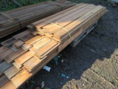 APPROXIMATELY 155 LINEAR METRES OF INTERLOCKING TIMBER BOARDS. CANADIAN RED CEDAR. APPROXIMATE NUMBE