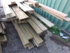 LARGE STACK OF ASSORTED TIMBER AND POSTS 10-17FT LENGTHS APPROX.