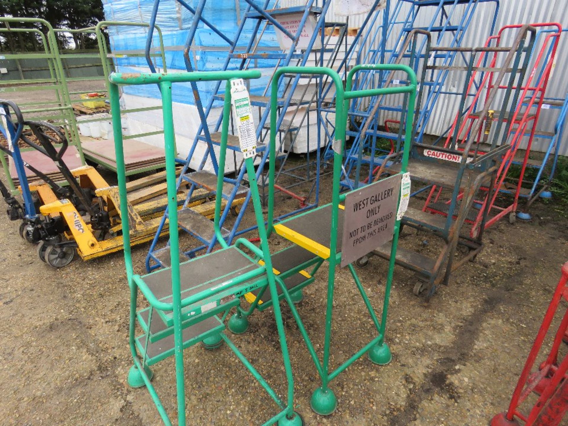 2 X 3 TREAD GREEN WHEELED WAREHOUSE STEPS.