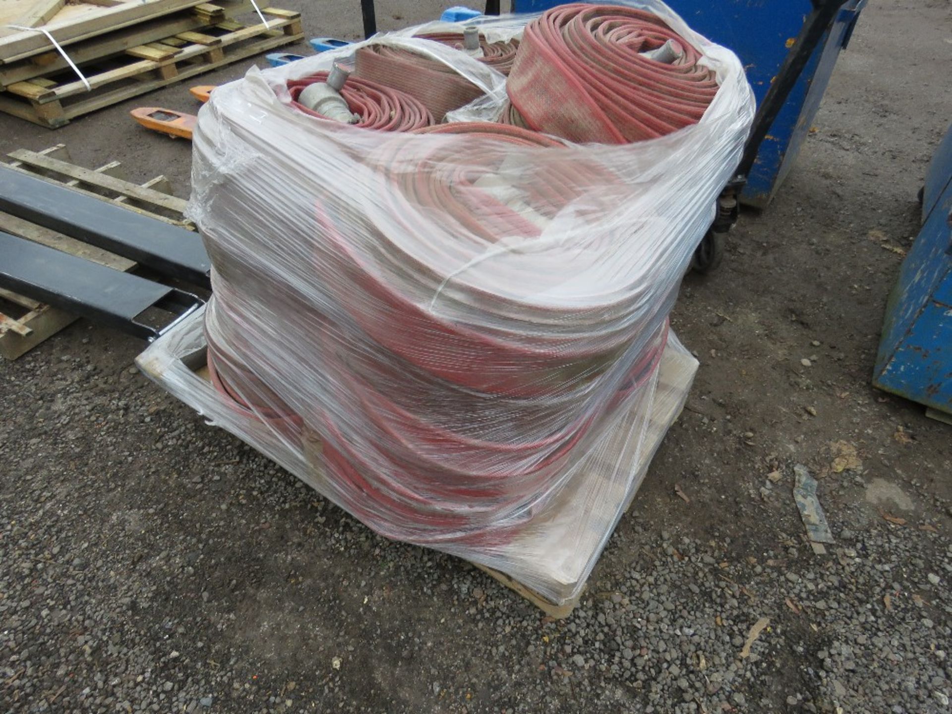 PALLET OF LAY FLAT HOSES, 25NO APPROX IN TOTAL.