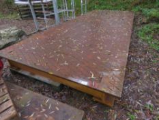 LARGE STEEL PLATFORM DECK, 18FT X 7FT APPROX. HEAVY CHEQUER PLATE TOP ON A GIRDER FRAME.