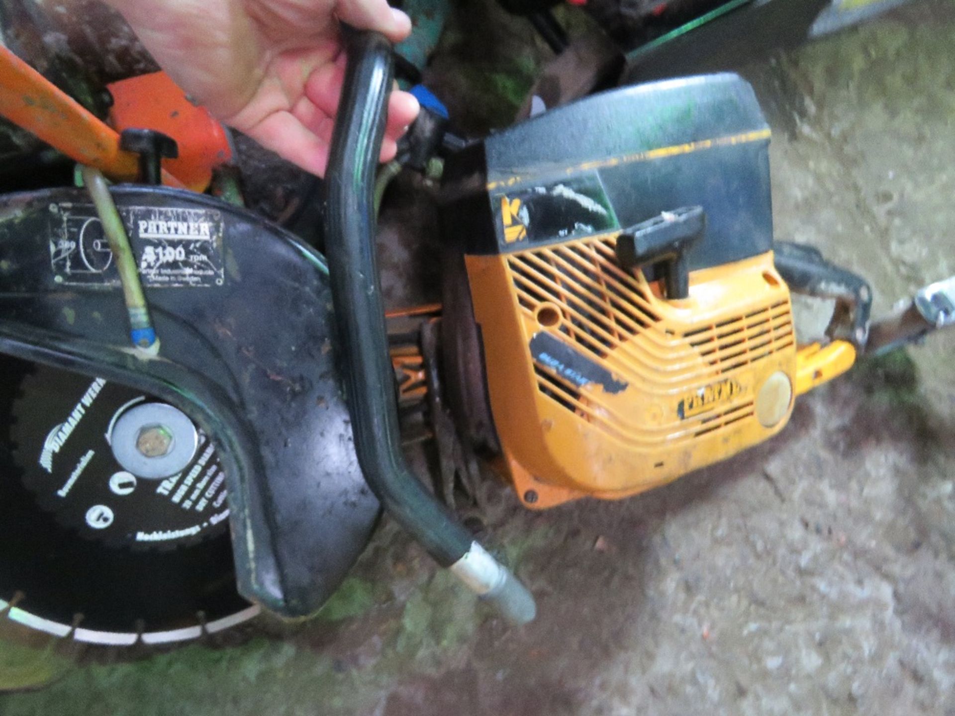 PARTNER PETROL SAW WITH BLADE.