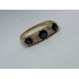 18 carat yellow gold sapphire and diamond ring