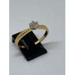 18 carat yellow gold diamond cluster ring