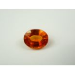 Unmounted 10.50ct orange sapphire