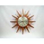 Vintage Metamec sunburst wall clock.