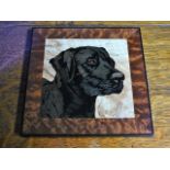 Inlaid marquetry portrait of a black labrador