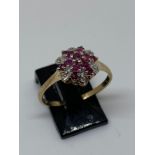 9 carat yellow gold ruby and diamond cluster ring