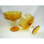 Pair of amber glass graduated tazzas