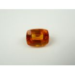 Unmounted cushion natural orange sapphire. 9.15ct