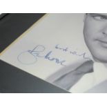 007 framed autographed Roger Moore photograph