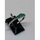 18ct gold emerald and diamond ring