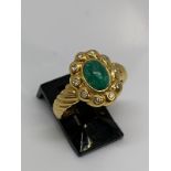 18ct gold emerald and diamond ring