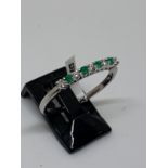 18ct gold emerald and diamond ring