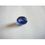 Unmounted oval cut natural tanzanite. 10.27ct