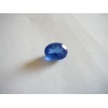 Unmounted oval cut natural tanzanite. 9.55ct