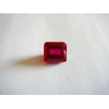 Unmounted emerald cut natural ruby. 12.07ct