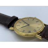 18ct gold Paul Buhre watch