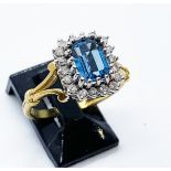 18ct gold topaz & diamond ring