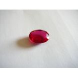 Unmounted oval cut natural ruby. 18.12ct