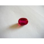 Unmounted oval cut natural ruby. 13.05ct