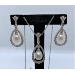 18ct white gold pearl & diamond pendant & earring set
