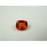 Unmounted cushion natural orange sapphire, 10.30ct