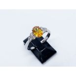 18ct white gold orange sapphire & diamond ring