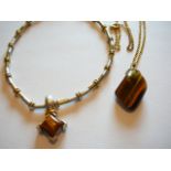 x2 Tiger Eye crystal pendants