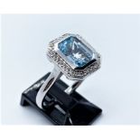 9ct white gold blue topaz & diamond ring