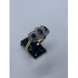 18ct gold sapphire 7 diamond ring