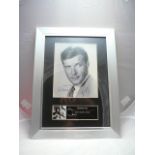 007 framed autographed Sir Roger Moore photograph