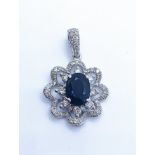 18ct white gold sapphire and diamond pendant