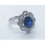 18ct white gold, sapphire and diamond ring