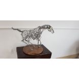 Galloping horse sculpture