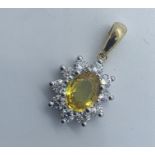 18ct gold yellow sapphire and diamond pendant