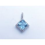 18ct white gold aquamarine and diamond pendant