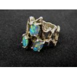 Silver and opal artisan filigree ring.