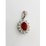 18ct white gold fire opal and diamond pendant