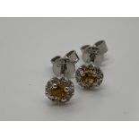 18ct white gold orange sapphire and diamond drop earrings