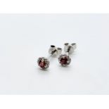 18ct white gold garnet and diamond earrings