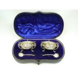 Boxed pair of silver table salts
