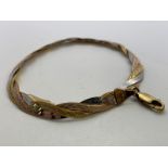 9ct tricolour gold bracelet.