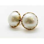 9 ct yellow gold mabe pearl earrings.