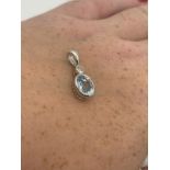 18ct white gold aquamarine and diamond pendant